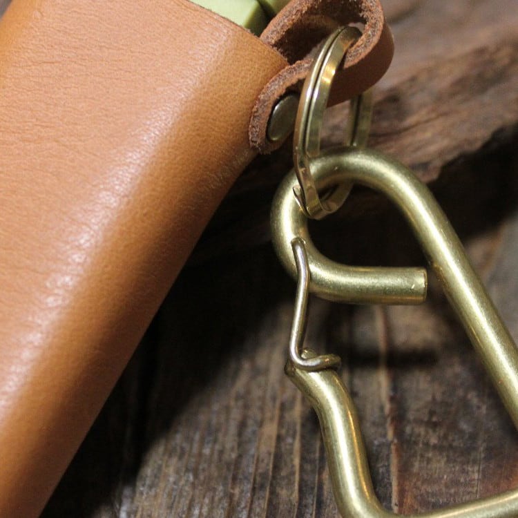 Solid brass carabiner holder